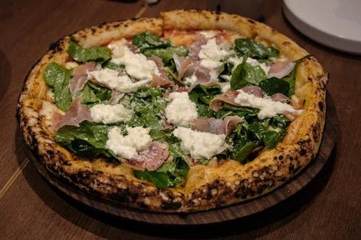 white sauce pizza with spinach ricotta